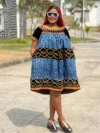 Cameroon women’s multicolor traditional dress with geometric and wave‑like designs – African cultural attire