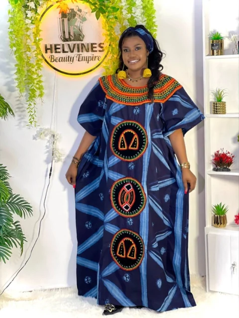 Cameroon women’s dark blue dress with circular embroidery and multicolor neckline – African cultural attire