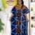 Cameroon women’s dark blue dress with circular embroidery and multicolor neckline – African cultural attire