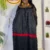 Cameroon women’s black dress with red bands and multicolor embroidery – African cultural attire