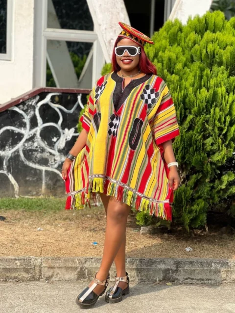 Cameroon women’s Toghu dress with red, yellow, and black embroidery – African cultural attire