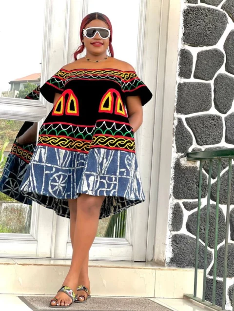 Cameroon women’s multicolored traditional dress with geometric and abstract patterns – African cultural attire