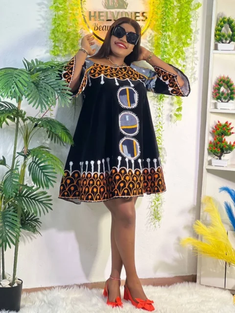 Cameroon women’s black dress with orange, white, and blue embroidery – African cultural attire